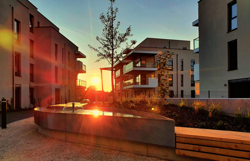 Wohnanlage Heliosallee Sonnenuntergang